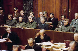Image: Nuremberg Doctors' Trial, the dock with Karl Brandt (front row, first from the left) and Viktor Brack (back row, 3rd from the left), 1947